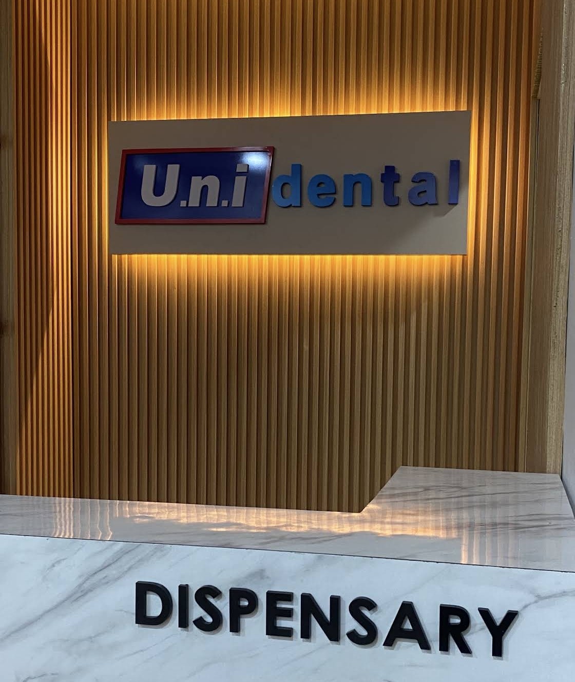 Papan tanda u.n.i dental